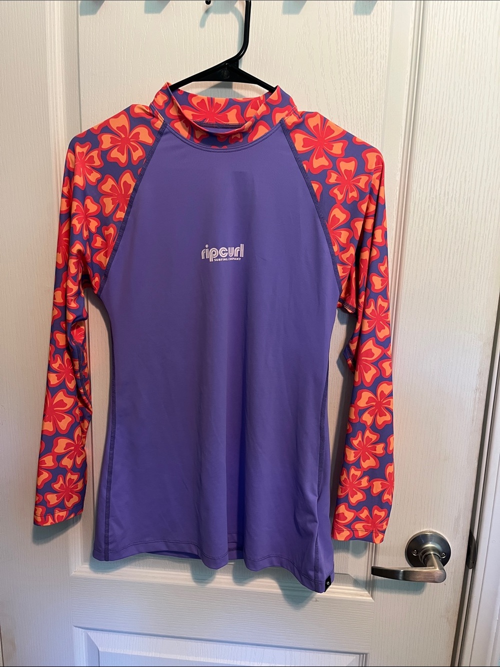 Rip Curl Purple Rash Guard with Orange-Pink Floral Sleeves